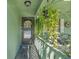 This property has a well lit front porch with hanging plants and room for furniture at 628 Mount Homer Rd # 4B, Eustis, FL 32726