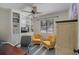 Office space with built-in shelves, chairs, and a desk at 628 Mount Homer Rd # 4B, Eustis, FL 32726