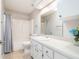 Clean bathroom with vanity, shower-tub combo, and tile flooring at 6410 Tildon Ct, Leesburg, FL 34748