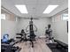 Private fitness center features modern equipment, including weight machines and free weights at 6410 Tildon Ct, Leesburg, FL 34748