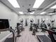 Bright fitness center featuring treadmills, elliptical machines, and mirrored walls at 6410 Tildon Ct, Leesburg, FL 34748