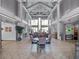 Spacious lobby with soaring ceilings, stylish decor, and comfortable seating areas at 6410 Tildon Ct, Leesburg, FL 34748
