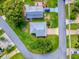 Aerial view of the home and outlining property lines at 701 Cottage Park Ln, Leesburg, FL 34748