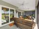 Outdoor living space featuring stylish furniture, a dining table, and scenic views, perfect for relaxation at 7250 Trundle Ter, The Villages, FL 34762