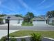 Charming single-Gathering homes showcase well-maintained exteriors and appealing landscaping at 7250 Trundle Ter, The Villages, FL 34762