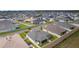 Neighborhood aerial view showcasing the community layout with well-maintained lawns at 7539 Hagemeyer Pl, The Villages, FL 34762