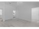 Expansive primary bedroom with carpet, ceiling fan and ensuite bathroom at 7539 Hagemeyer Pl, The Villages, FL 34762