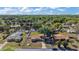 A lovely aerial view shows the entire property in a beautiful neighborhood at 900 Maple Ave, Fruitland Park, FL 34731