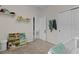 Bedroom features a closet, shelves and window at 916 Carmillion Ct, Groveland, FL 34736