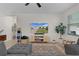 Bright living room with plush seating and a modern entertainment center, showcasing a relaxed and inviting atmosphere at 916 Carmillion Ct, Groveland, FL 34736