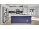Modern kitchen boasts stainless steel refrigerator, white cabinets, and a striking blue-tiled backsplash at 10219 Lenox St, Clermont, FL 34711