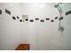 Updated bathroom with a tiled shower, niche and modern fixtures at 110 N Tremain St # 205, Mount Dora, FL 32757