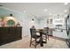 Spacious kitchen featuring modern appliances, custom cabinets, and a stainless steel sink at 110 N Tremain St # 205, Mount Dora, FL 32757