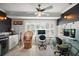 Bright office space with built-in cabinets and dual computer setup at 110 N Tremain St # 205, Mount Dora, FL 32757
