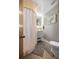 Bathroom featuring a shower, vanity, and toilet at 1107 Valley Rd, Fruitland Park, FL 34731