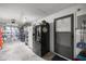 A well organized garage with lots of storage space and room for two cars at 1107 Valley Rd, Fruitland Park, FL 34731