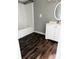 Bathroom featuring a shower-tub combo and a vanity with cabinet storage at 11252 Country Haven Dr, Lakeland, FL 33809