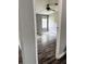 Cozy bedroom with ample natural light and wood grain flooring at 11252 Country Haven Dr, Lakeland, FL 33809