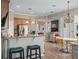 Kitchen featuring a center island with granite countertops and stainless steel appliances at 12136 Se 176Th Loop, Summerfield, FL 34491
