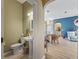 Powder room features a white pedestal sink at 12136 Se 176Th Loop, Summerfield, FL 34491