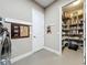 Well-organized pantry with ample shelving providing plenty of storage at 142 Bayou Bend Rd, Groveland, FL 34736