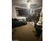Bedroom space with an unmade bed and personal effects, with ample space for relaxation at 15159 Sw 43Rd Terrace Rd, Ocala, FL 34473