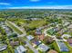 Lovely neighborhood with well-maintained homes and lush green spaces create a serene setting at 17594 Se 95Th Cir, Summerfield, FL 34491