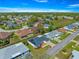 Aerial view of a residential neighborhood featuring well-maintained homes and lush greenery at 17594 Se 95Th Cir, Summerfield, FL 34491