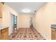 Kitchen area with access to the patio and the laundry room at 17594 Se 95Th Cir, Summerfield, FL 34491