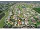 A beautiful golf course community with mature landscaping and well-maintained homes; view of the area surrounding the property at 17898 Se 125Th Cir, Summerfield, FL 34491