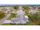 Lovely home with a well-manicured lawn and driveway nestled in a quiet residential neighborhood with mature trees at 17965 Se 107Th Ct, Summerfield, FL 34491