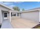 Large driveway leading to home's front entrance at 17965 Se 107Th Ct, Summerfield, FL 34491