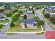 An aerial view of a property showcasing its landscaping, proximity to amenities, and neighborhood layout at 1852 Rafton Rd, Apopka, FL 32703