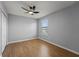 Empty bedroom with a ceiling fan and laminate flooring at 1852 Rafton Rd, Apopka, FL 32703