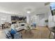 Open-concept living area with a seamless flow to the kitchen and dining, perfect for modern living at 1852 Rafton Rd, Apopka, FL 32703