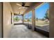A covered and screened outdoor patio offers a pleasant view of the surrounding neighborhood at 1852 Rafton Rd, Apopka, FL 32703