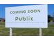 Sign announcing a future Publix grocery store, emphasizing convenience and local shopping at 1852 Rafton Rd, Apopka, FL 32703