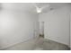 Minimalist bedroom with neutral carpet and white walls, offering a blank canvas for personalization at 1853 Pasqua Pl, The Villages, FL 32163