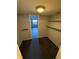 Walk-in closet with a view of the bedroom and with shelving at 1928 Conway Rd # 23, Orlando, FL 32812