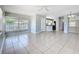 Bright living area with tile flooring, open floor plan, and ample natural light at 193 Bay Rd, Mount Dora, FL 32757