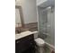 Beautifully updated bathroom features modern vanity and tiled walk-in shower at 2181 Gretna Dr, Deltona, FL 32738