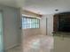 Dining area with a large bay window allowing ample natural light, adjacent to the kitchen at 2181 Gretna Dr, Deltona, FL 32738