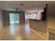 Spacious living area featuring tile flooring and access to the outdoor pool area at 2181 Gretna Dr, Deltona, FL 32738