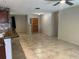 Open-concept living space with tile flooring, seamlessly connected to the kitchen area at 2181 Gretna Dr, Deltona, FL 32738
