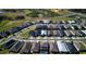 Aerial view highlighting a single-Gathering home in a neighborhood with a manicured lawns and well-maintained streets at 2183 Ridge Pointe Ln, Clermont, FL 34715