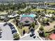 Aerial view of the community clubhouse and heart shaped resort style pool at 2183 Ridge Pointe Ln, Clermont, FL 34715
