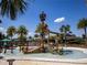 Community splash pad featuring a unique pirate ship play structure, perfect for Gathering fun on sunny days at 2183 Ridge Pointe Ln, Clermont, FL 34715