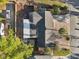 Detailed aerial of the property highlighting the landscaped yard, driveway, and street access at 219 N Rossiter St, Mount Dora, FL 32757