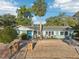 Charming single-story home with a well-manicured lawn and inviting curb appeal at 219 N Rossiter St, Mount Dora, FL 32757