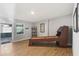 Spacious game room with a shuffleboard table and lots of light at 219 N Rossiter St, Mount Dora, FL 32757